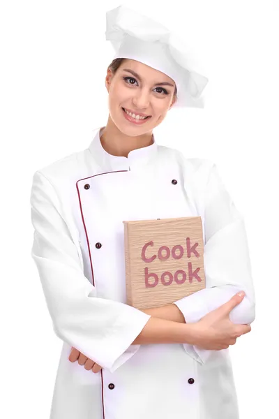 Retrato de jovem chef com livro de cozinha isolado em branco — Fotografia de Stock