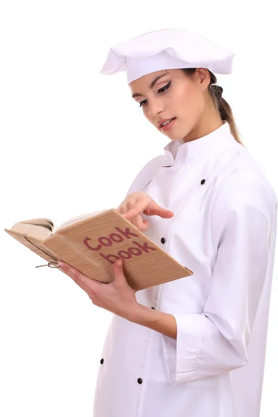 Portrait de jeune femme chef avec livre de cuisinier isolé sur blanc — Photo