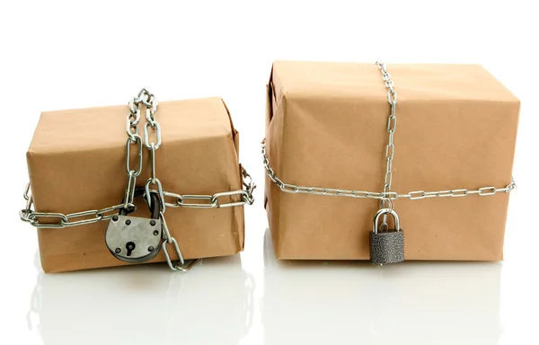 Parcels with chains, isolated on white — Stock Photo, Image