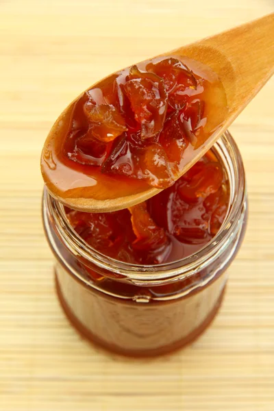 Tasty homemade jam, on bamboo mat — Stock Photo, Image