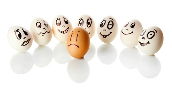 Huevos con caras graciosas aislados en blanco —  Fotos de Stock