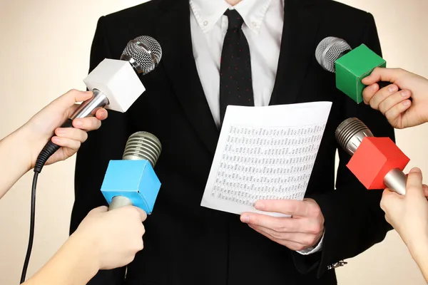 Conference meeting microphones and businessman — Stock Photo, Image