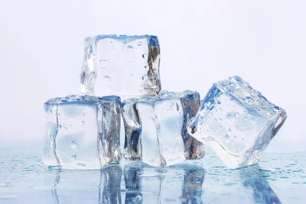 Ice on light background — Stock Photo, Image