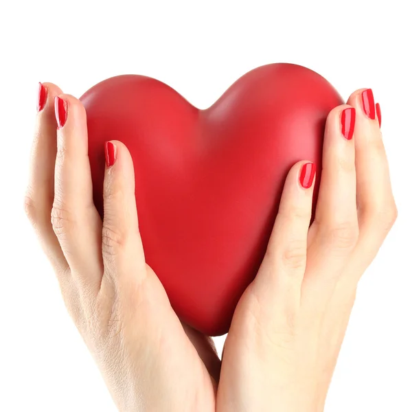 Kadının elinde, üzerinde beyaz izole kırmızı kalp — Stok fotoğraf