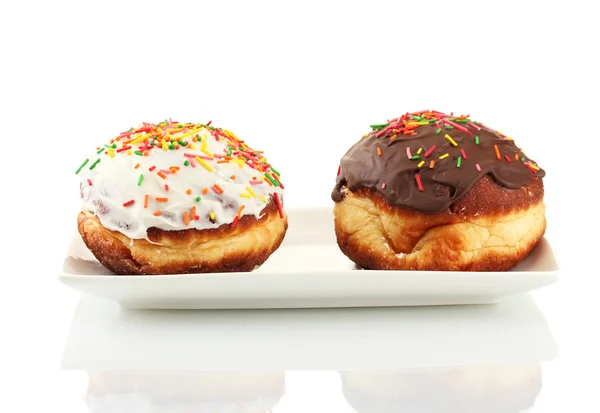 Smakelijke donuts geïsoleerd op wit — Stockfoto