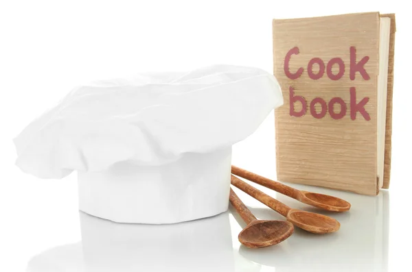 Chapéu de chef com colheres e livro de cozinha isolado em branco — Fotografia de Stock