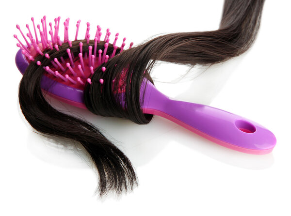 comb brush with hair, isolated on white