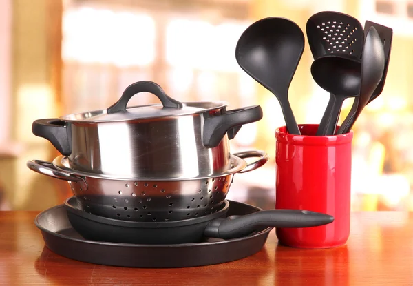 Kitchen tools on table in kitchen — Stock Photo, Image