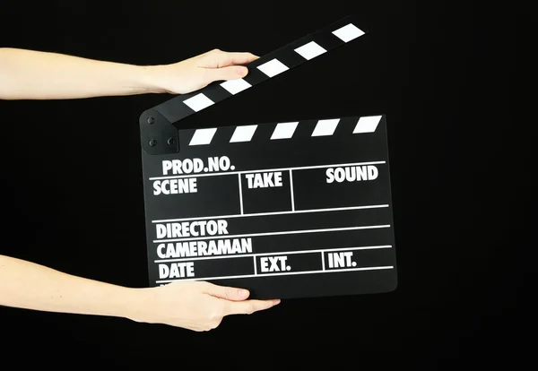 Film productie klepel board geïsoleerd op zwart — Stockfoto