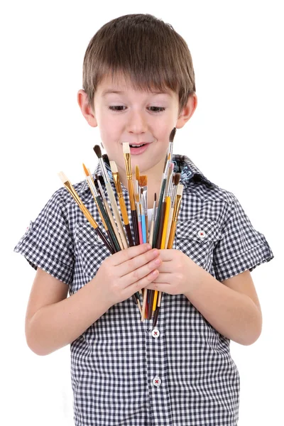 Cute little boy with paintbrushes isolated on white — Stock Photo, Image