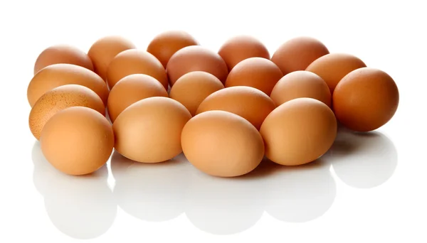 Fazla yumurta üzerinde beyaz izole — Stok fotoğraf