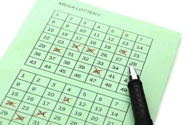 Loterij ticket en pen, geïsoleerd op wit — Stockfoto