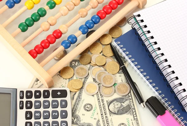 Bright wooden abacus and calculator. Conceptual photo of old and modern business — Stock Photo, Image