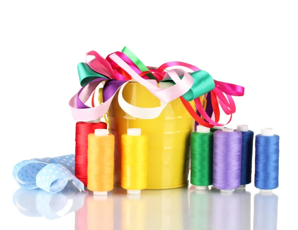 Color bucket with multicolor ribbons and thread isolated on white — Stock Photo, Image