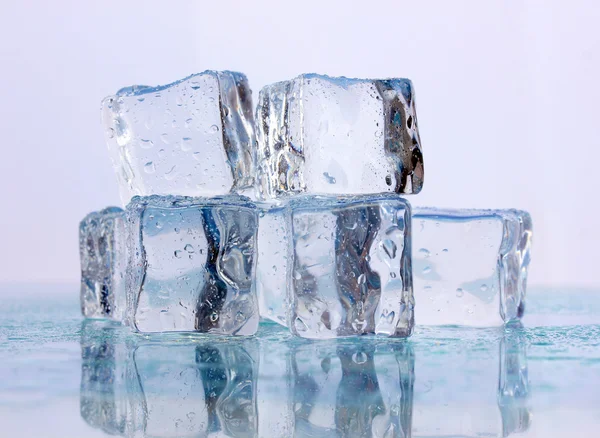 Ice on light background — Stock Photo, Image