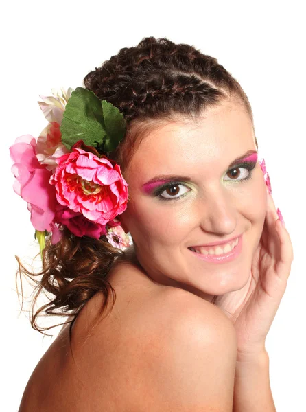Bella ragazza con fiori nei capelli isolati su bianco Immagine Stock