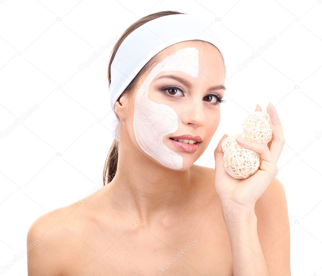 Young woman with clay facial mask, isolated on white