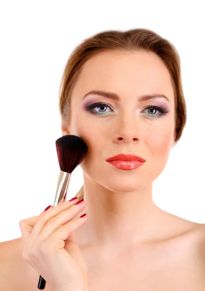Portrait of beautiful woman with make-up brush for powder, isolated on white — Stock Photo, Image