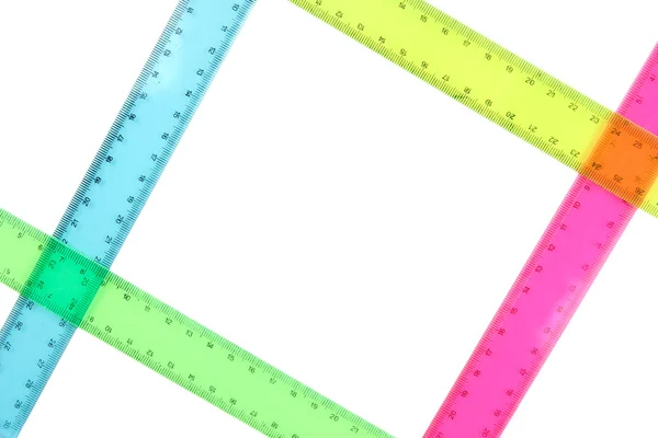 Plastic rulers isolated on white — Stock Photo, Image