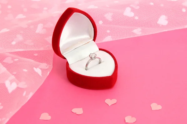 Beautiful box with wedding ring on pink background — Stock Photo, Image