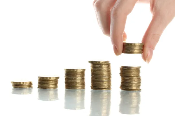 Hand holding coins isolated on white — Stock Photo, Image