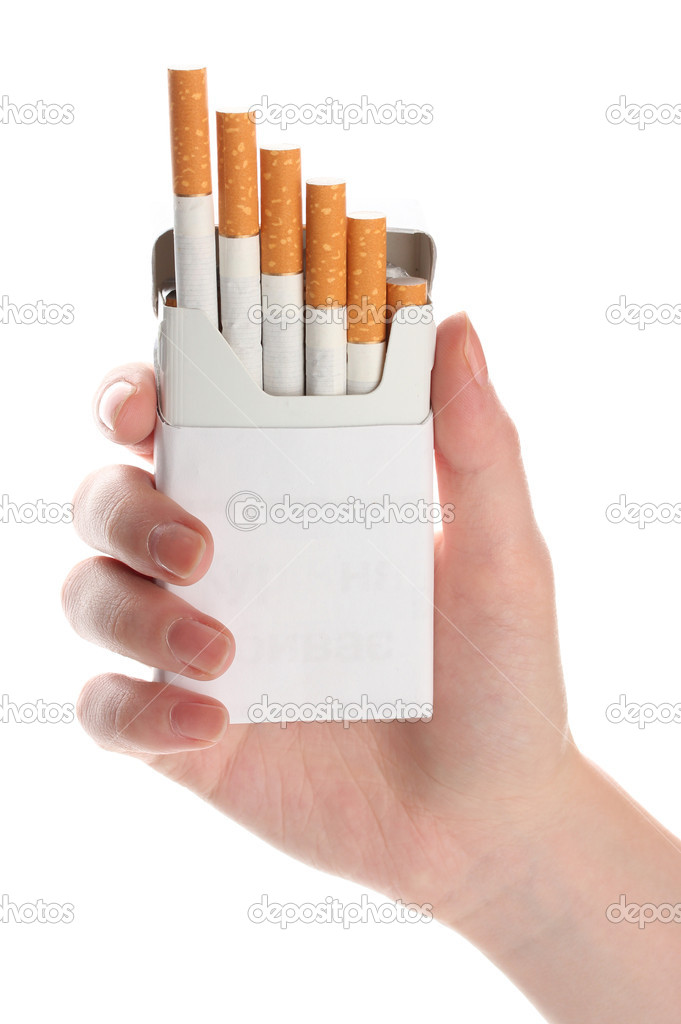 Woman hand with box of cigarettes, isolated on a white
