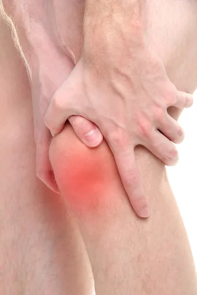 Man memegang lutut sakit, terisolasi pada putih — Stok Foto