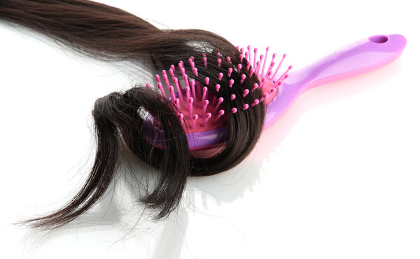comb brush with hair, isolated on white