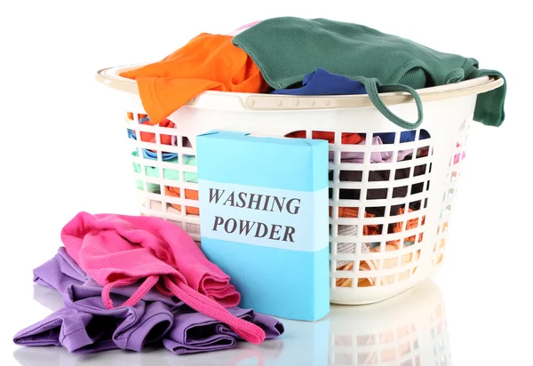 Clothes with washing powder in plastic basket isolated on white — Stock Photo, Image