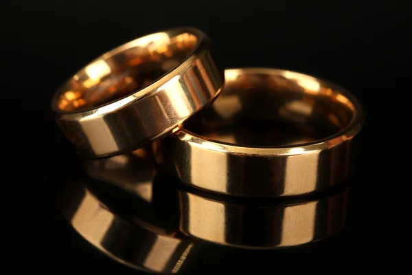 Wedding rings isolated on black — Stock Photo, Image