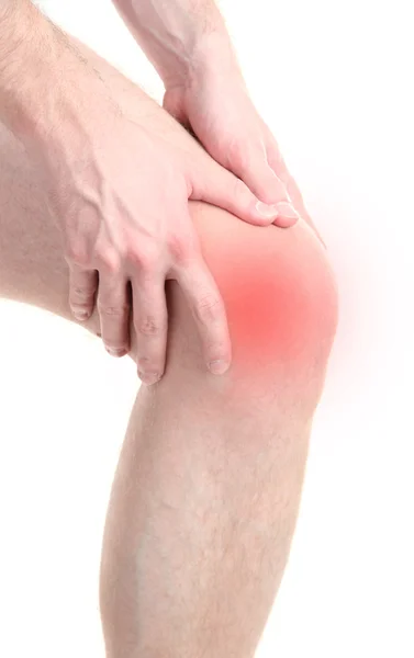 Man met zere knie, geïsoleerd op wit — Stockfoto