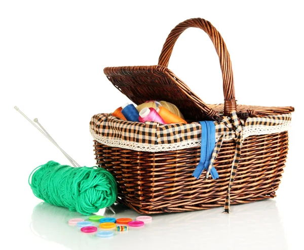 Wicker basket with accessories for needlework isolated on white — Stock Photo, Image