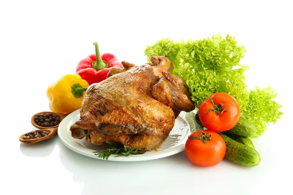 Tasty whole roasted chicken on plate with vegetables, isolated on white — Stock Photo, Image