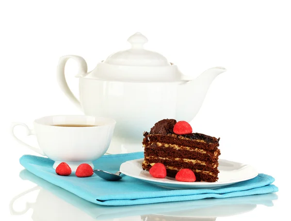Teapot, cup of tea and delicious cake isolated on white — Stock Photo, Image