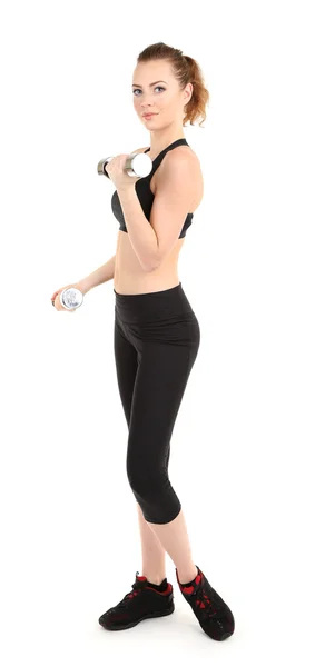 Genç bir kadın fitness egzersizleri üzerinde beyaz izole dumbbell ile yapıyor. — Stok fotoğraf