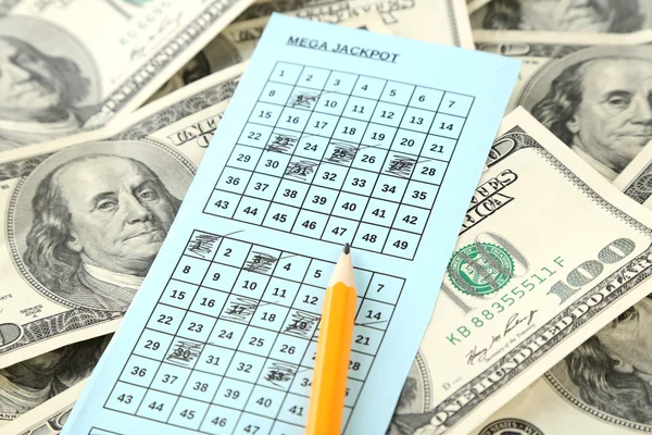 Lottery ticket, money and pencil, close up — Stock Photo, Image