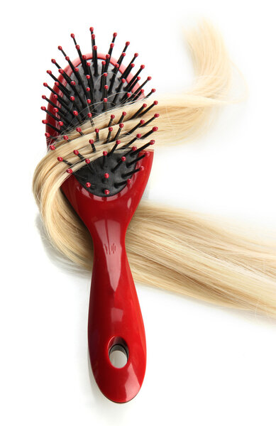 comb brush with hair, isolated on white