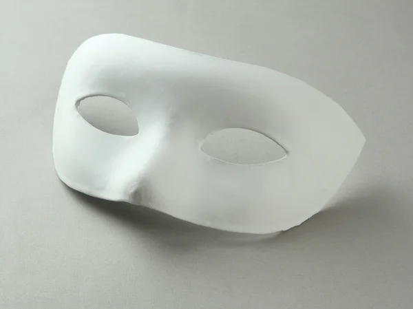 White mask, on grey background — Stock Photo, Image