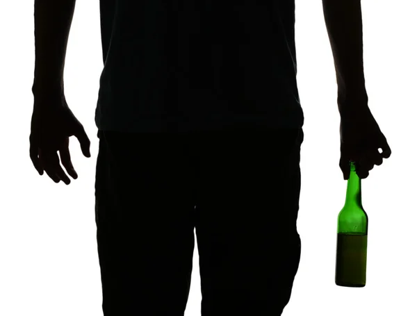 Silhuett av man med en flaska alkohol, isolerad på vit — Stockfoto