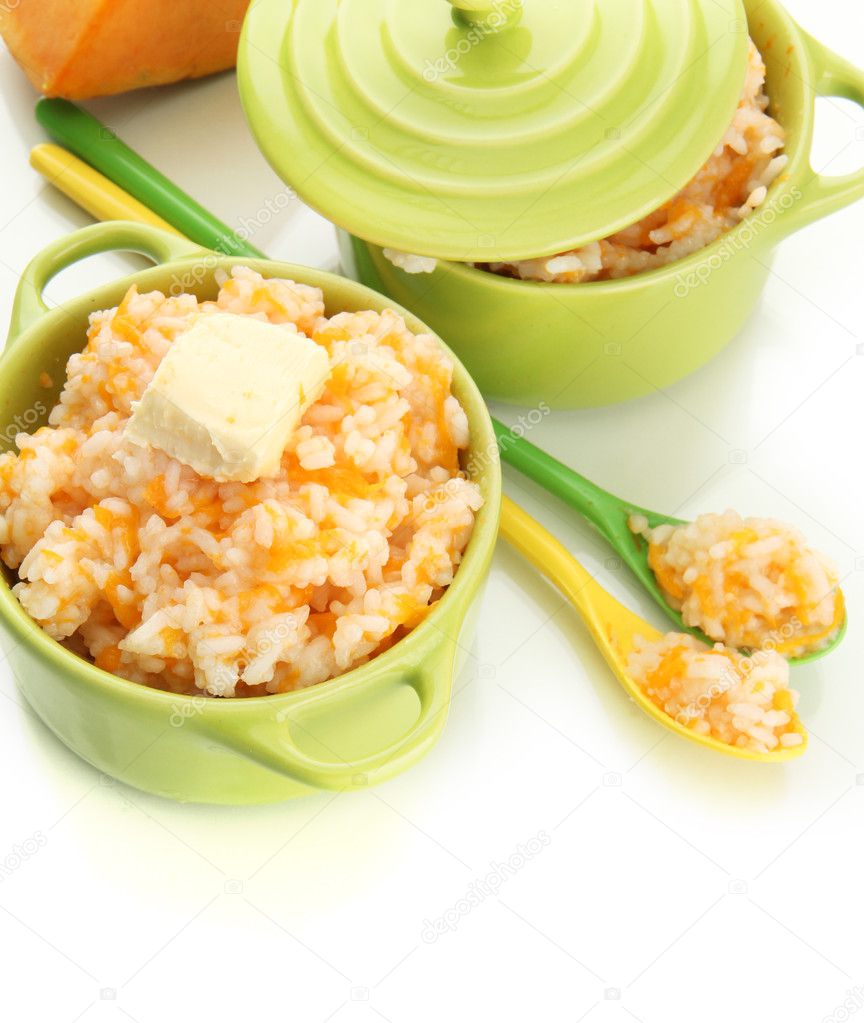 Taste rice porridge with pumpkin in saucepans, isolated on white