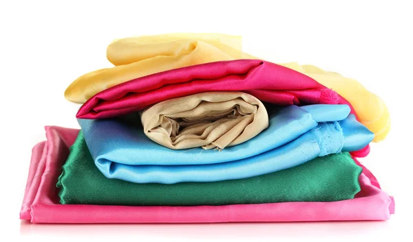 Pile of different fabrics isolated on white — Stock Photo, Image