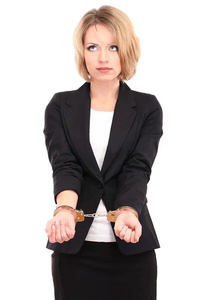 Молода красива бізнес-леді в наручниках ізольована на білому — стокове фото