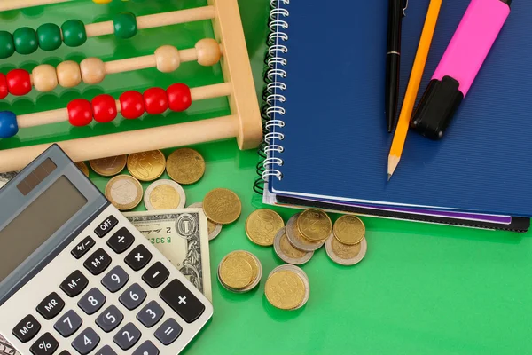 Bright wooden abacus and calculator. Conceptual photo of old and modern business — Stock Photo, Image