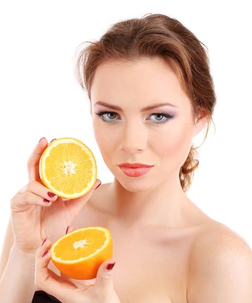 Beautiful young woman with bright make-up, holding orange, isolated on white — Stock Photo, Image