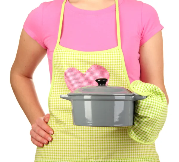 Closeup of homemaker in apron holding pan isolated on white — Stock Photo, Image