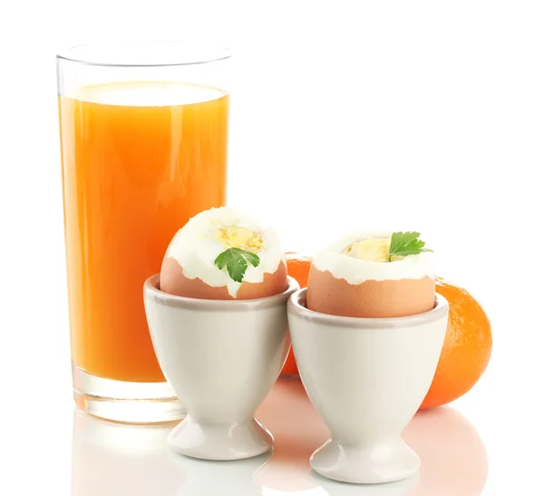 Café da manhã leve com ovos cozidos e copo de suco, isolado em branco — Fotografia de Stock