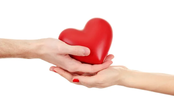 Red heart in woman and man hands, isolated on white — Stock Photo, Image