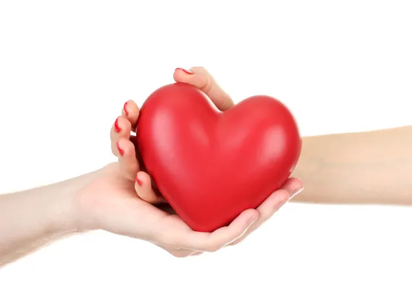 Coração vermelho em mãos de mulher e homem, isolado em branco — Fotografia de Stock