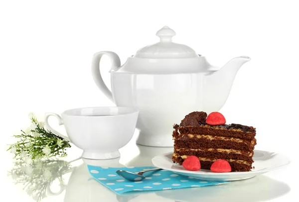 Teapot, cup of tea and delicious cake isolated on white — Stock Photo, Image