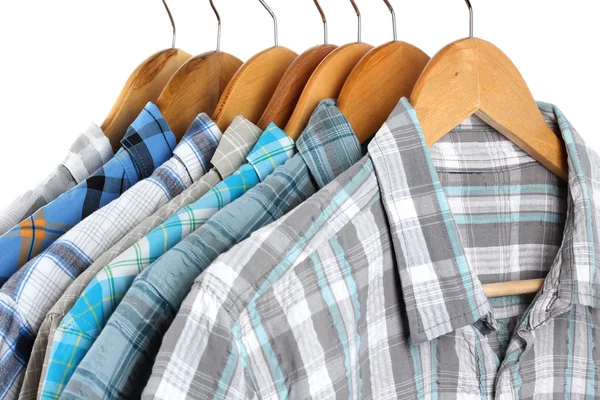 Shirts met banden op houten hangers geïsoleerd op wit — Stockfoto